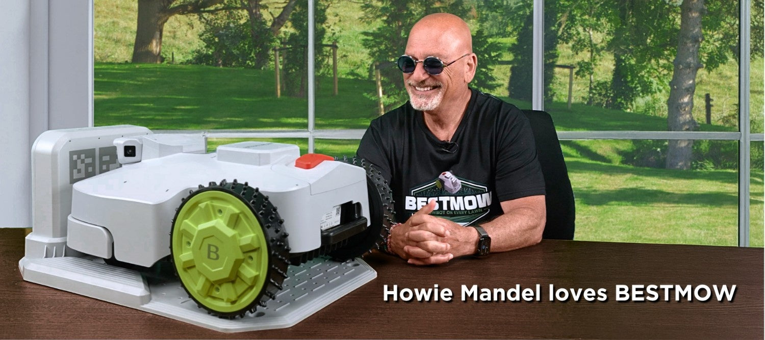 Howie Mandel, Canadian celebrity is looking at BESTMOW robot mower on his desk